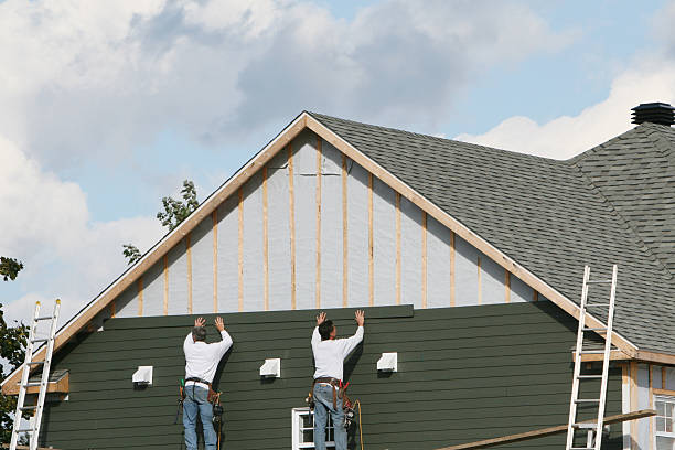 Professional Wood Siding technician working in Towson, MD
